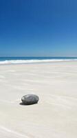 Zen Stone On Pristine Beach photo