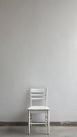 Solitary White Chair Portrait photo