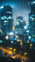 City Lights Reflected On Rainy Window photo
