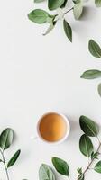 Minimalist Tea and Leaves Flatlay photo