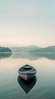 Solitary Boat on Calm Lake photo