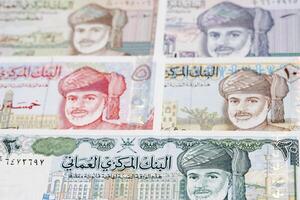 Old Omani rial a business background photo