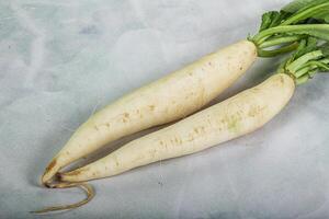 Raw ripe organic Daikon root photo