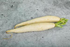 Raw ripe organic Daikon root photo