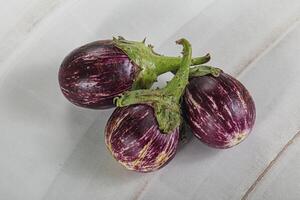 Raw ripe asian small eggplant photo