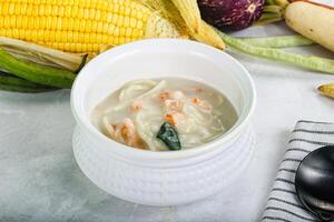 Soup with prawn and noodle photo