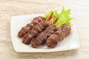 Beef kebab skewer minced meat photo