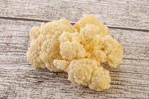 Raw white cauliflower cabbage heap photo