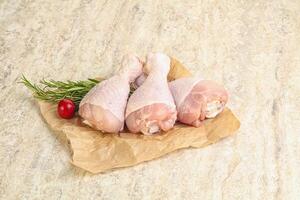 Raw chicken leg Drumstick for cooking photo