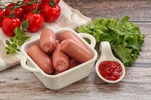 Mini baby sausages for breakfast photo