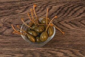 Caper berries in the bowl photo