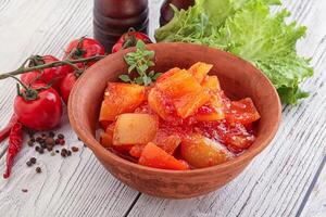 Hungarian lecho with tomato and paprika photo