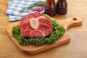 Raw ossobuco beef meat for cooking photo