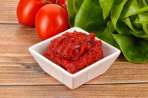 Tomato puree sauce for cooking photo