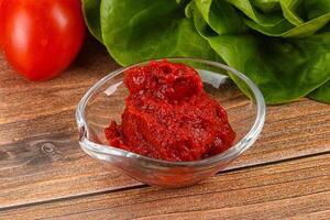 Tomato puree sauce for cooking photo