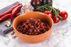 Red canned beans in the bowl photo