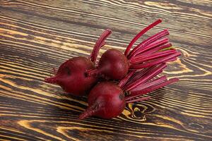 Young raw beetroot heap isolated photo