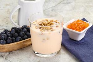 Yoghurt with granola and blueberry photo