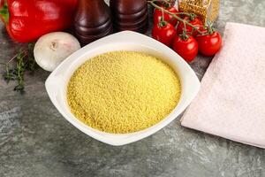 Raw dry wheat couscous grain photo