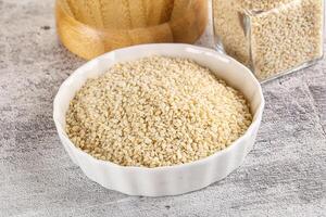 Sesame seeds heap in the bowl photo