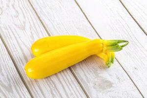 Yellow young zucchini for cooking photo