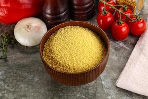 Raw dry wheat couscous grain photo