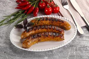 Grilled meat sausages with spices photo