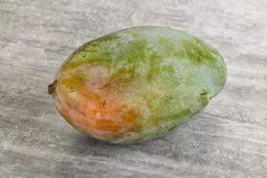 Ripe sweet green tropic mango photo