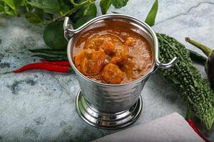 Indian cuisine - Masala with prawn photo