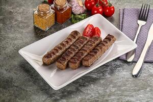 Grilled beef kebab minced meat photo