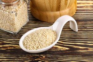 Sesame seeds heap in the bowl photo