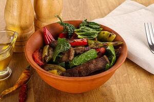 Salad with grilled beef steak photo