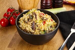 Bulgur with lamb and vegetables photo