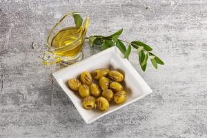 Grilled green olives appetizer snack photo