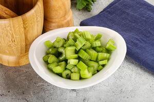 Vegan cuisine - Sliced celery stem photo