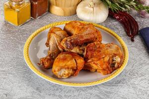 Raw marinated chicken drumstick for cooking photo