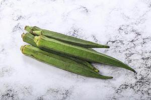 Green ripe tasty okra tropical vegetable photo