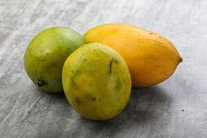 Fresh sweet and juicy mango heap photo