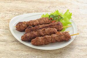 Beef kebab skewer minced meat photo