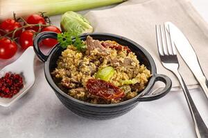 Bulgur with lamb and vegetables photo