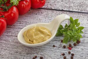 Spicy Mustard sauce in the bowl photo