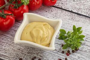 Spicy Mustard sauce in the bowl photo