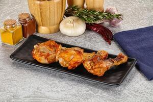 Raw marinated chicken drumstick for cooking photo