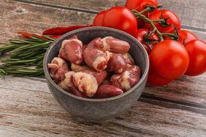 Raw chicken hearts for cooking photo