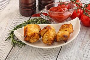 Chicken breast shashlik - grilled meat photo