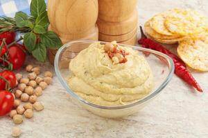 Natural organic chickpea hummus with olive oil photo