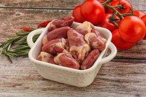 Raw chicken hearts for cooking photo