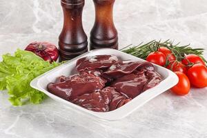 Raw turkey liver in a bowl ready for cooking photo