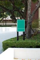 Empty square green metal sign photo