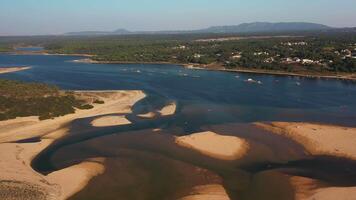 Lagoa de Albufeira Aerial view, natural lake meeting the Atlantic Ocean Portuguese coastline video